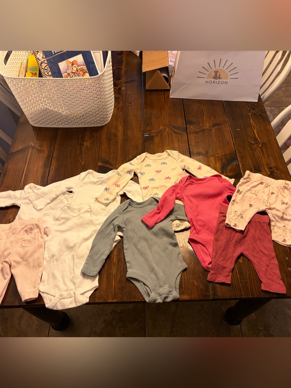 6 baby long sleeve body suits and 3 pants (0-3M)